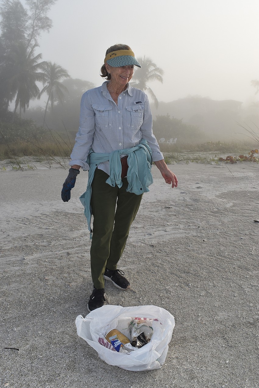 Carol Jensen stuck closer to the vegetation line and found more trash.