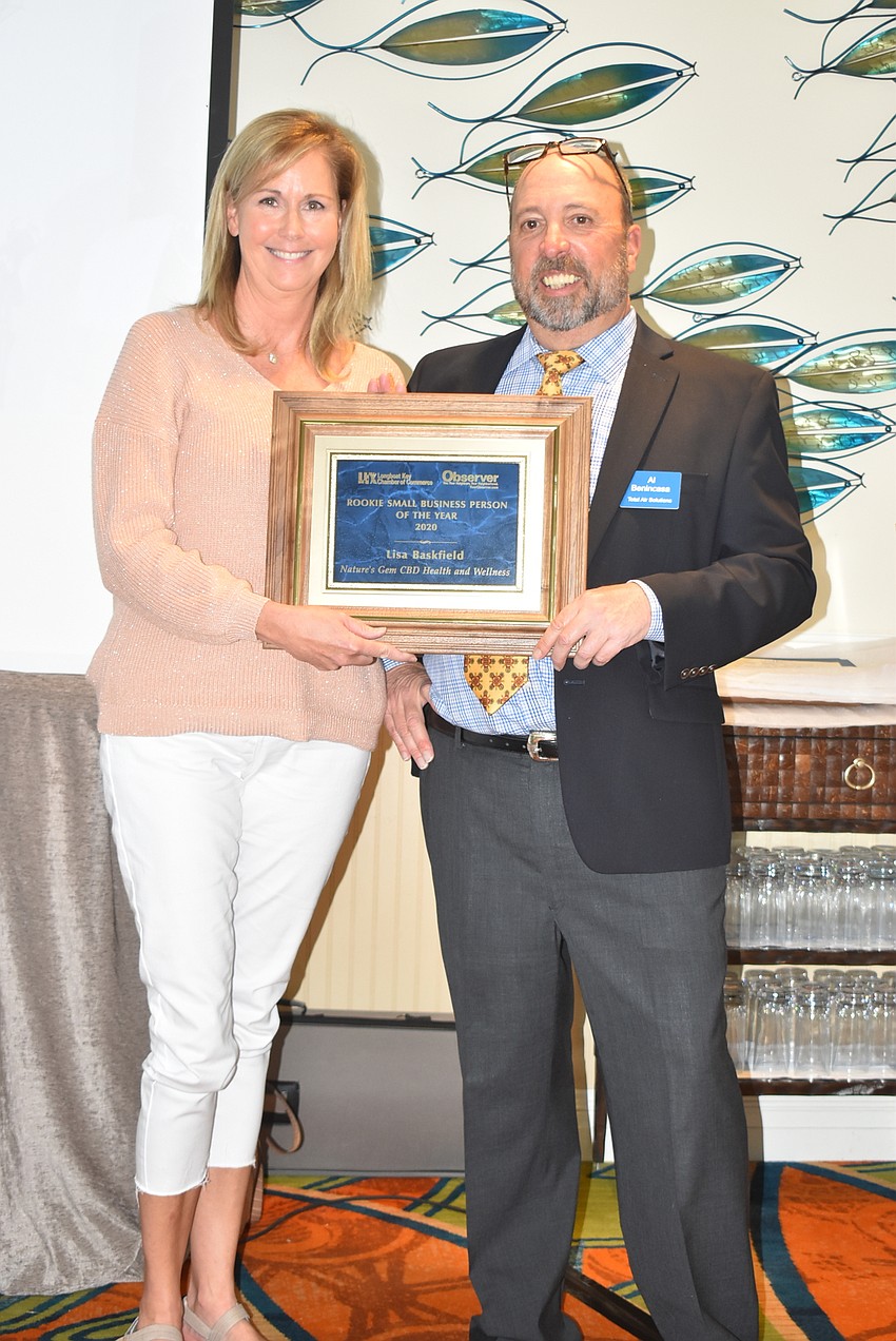 Lisa Baskfield, first in Rookie Business Person of the Year, and Al Benincasa