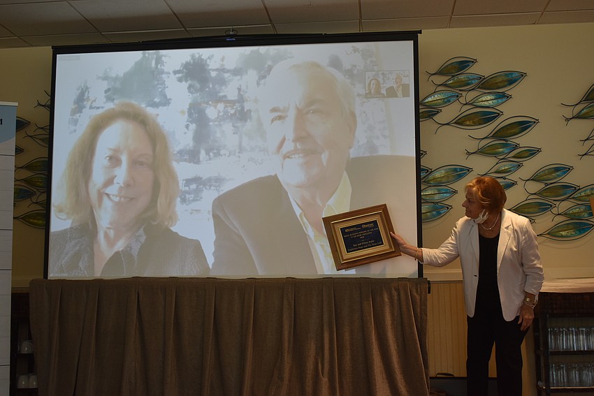 D'Arcy and Ray Arpke, first in Small Business Person of the Year (11 or more employees) with Gail Loefgren