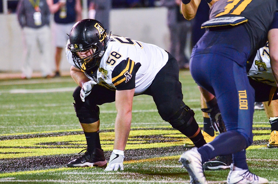 Appalachian State offensive lineman Ryan Neuzil, a Braden River High alumnus, is projected to go on day three of the 2021 NFL Draft.  Photo courtesy Appalachian State Athletics.