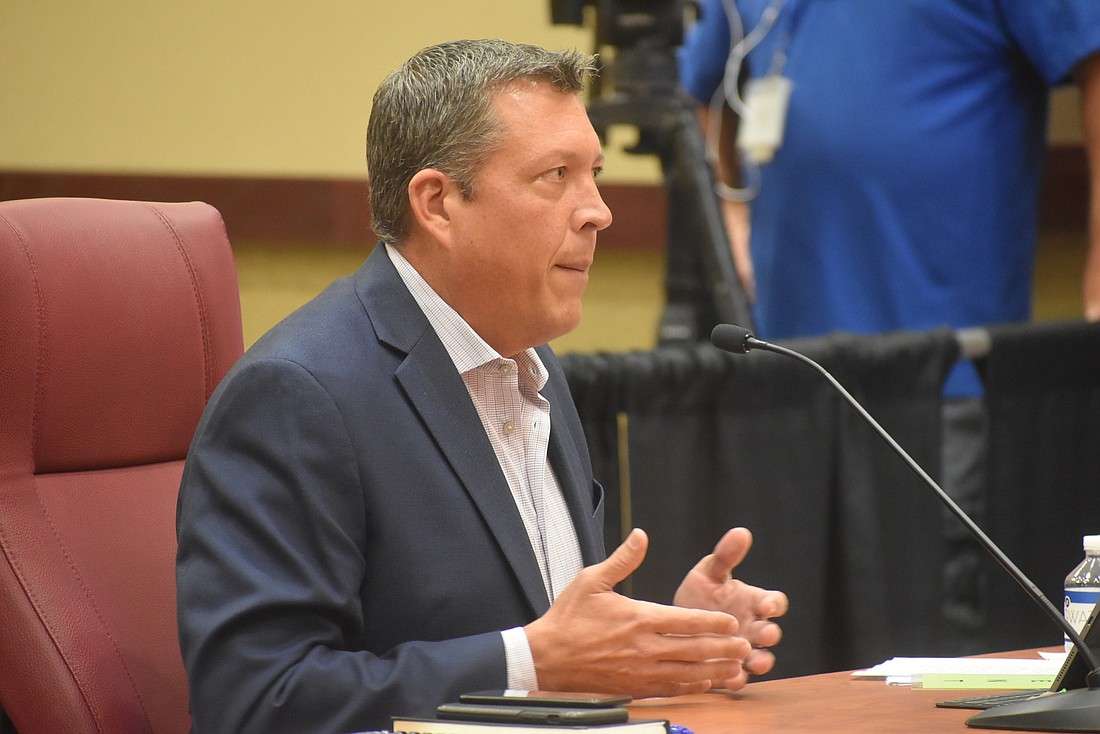 Manatee County commissioner George Kruse, pictured at the Nov. 19 meeting where the status of Coryea&#39;s contract first came into question, said his comment about blackmail wasn&#39;t an accusation against Carol Whitmore.