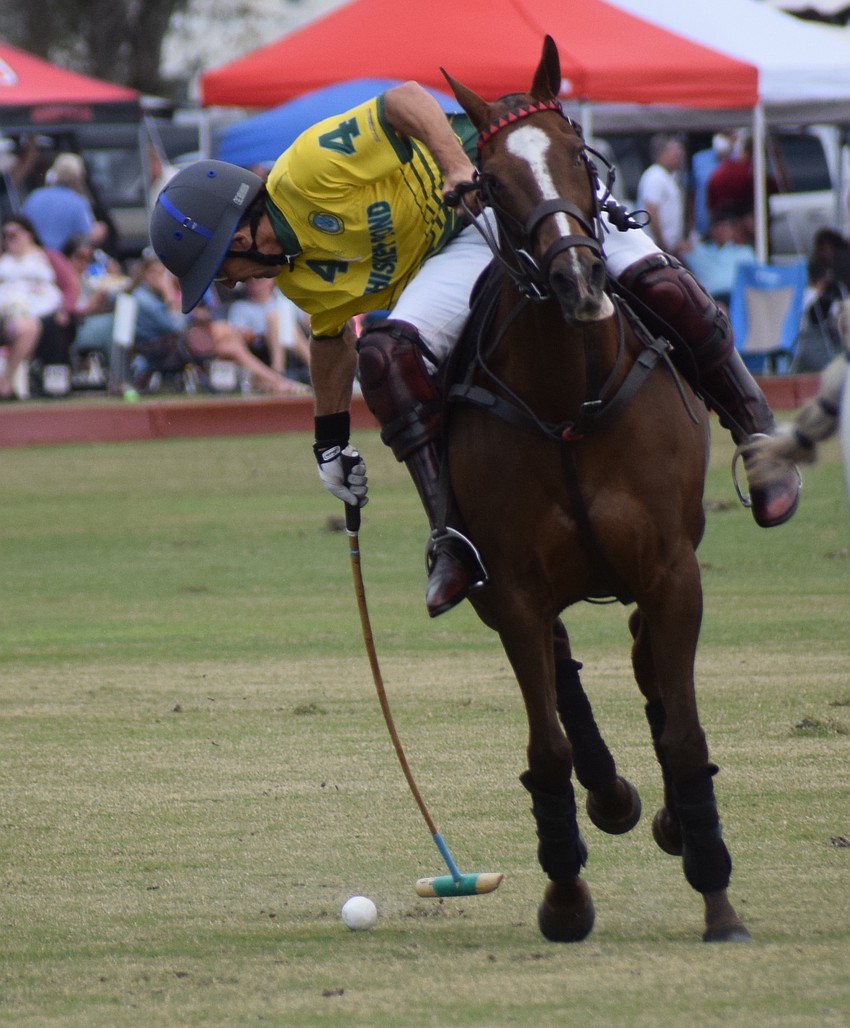 Whiskey Pond's Toto Collardin had his face to the ground as he drives a shot upfield.