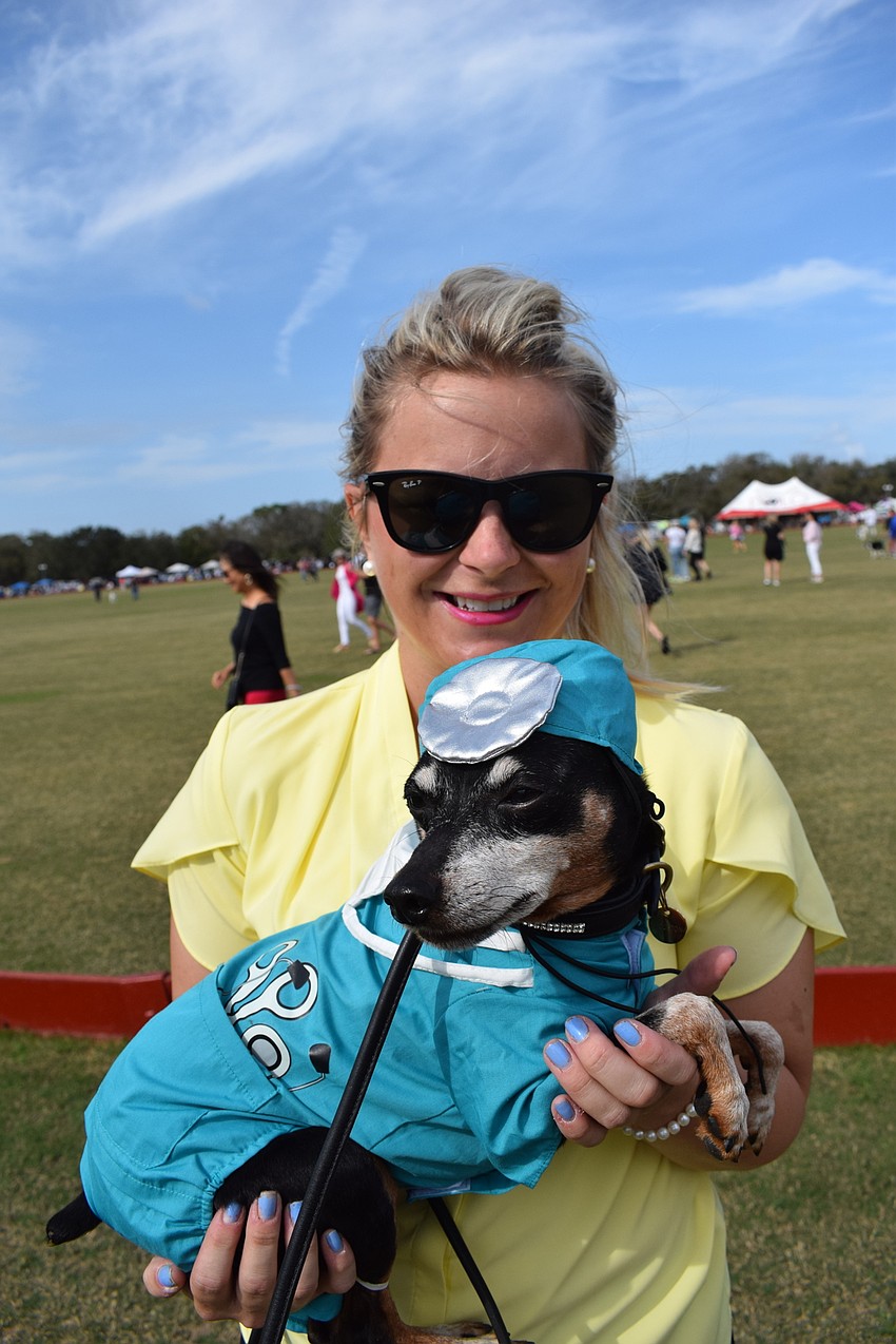 Lakewood Ranch's Ashley Davis has her hands full with Houston, a miniature pinscher.