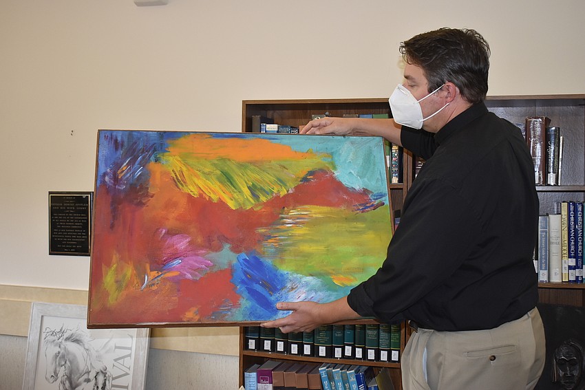 Dave Marshall bought a piece for the church office.