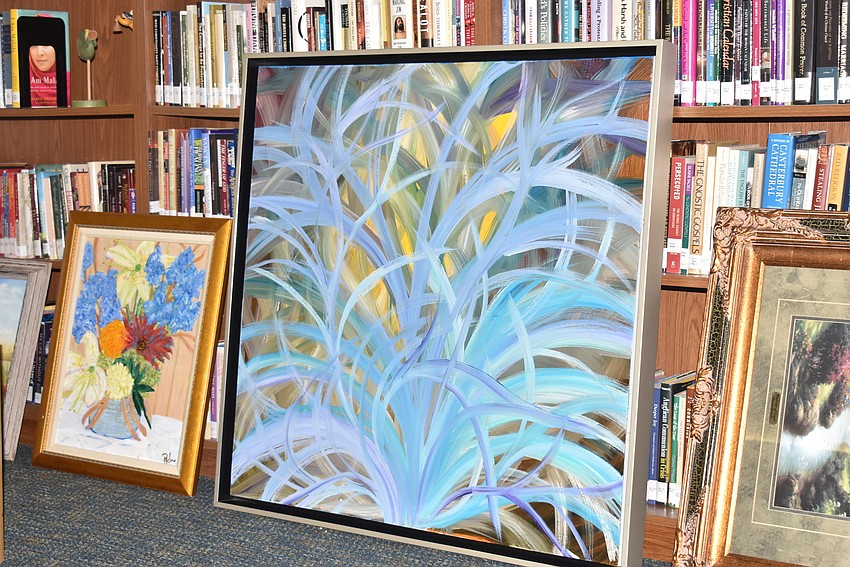 The art rested in the library before it was hung in the gallery.