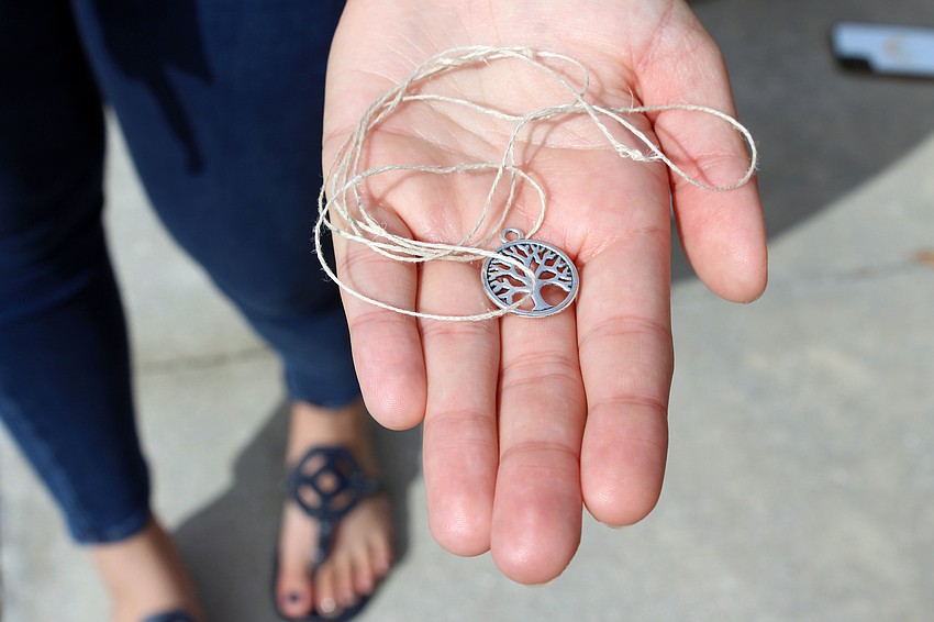 Each participant was given a tree of life necklace.