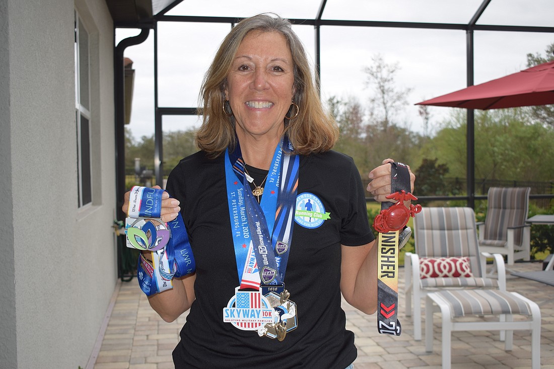 Arbor Grande&#39;s Donna Marino has earned dozens of medals for participating in more than 28 races over the past 25 years.