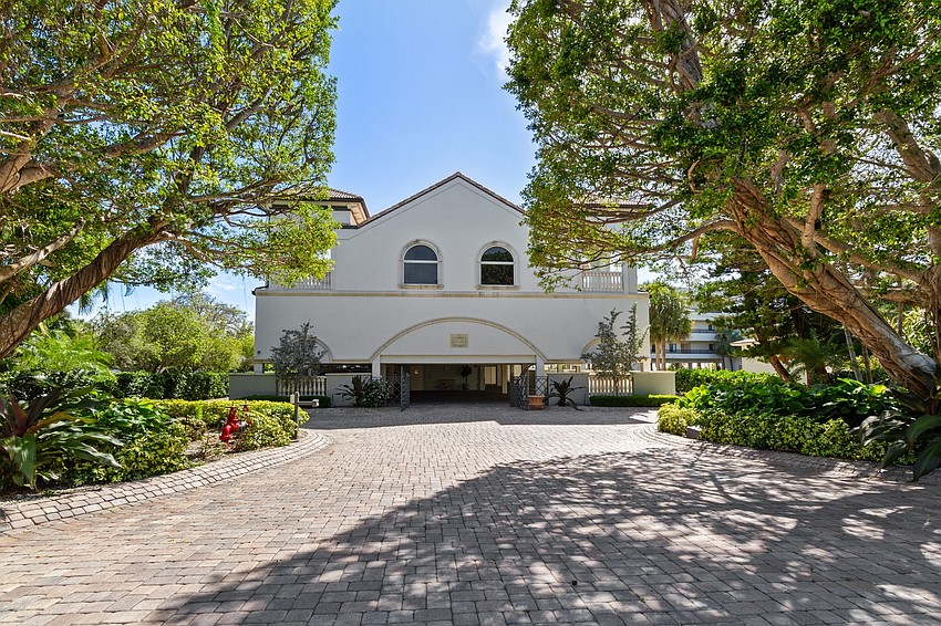 The home is located at 5541 Gulf of Mexico Drive, adjacent to Joan Durante Park.