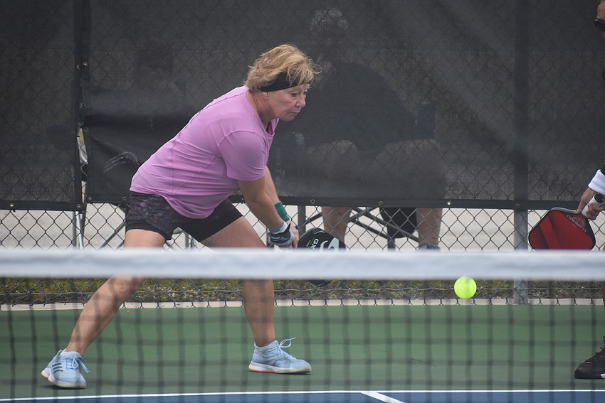 River Strand resident Roxann Viera has been playing pickleball for about four years. She and teammate Jacque Marks, a Stony Brook resident, won their first match 15-14.