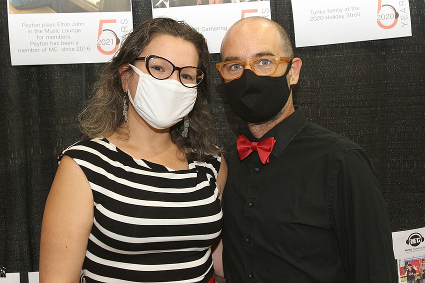 Paula and Marcial Jaramillo looked at the Music Compound's history maze.