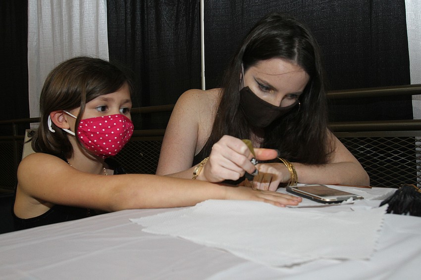 Claira Price had her hand painted by Eden Stahlmann.