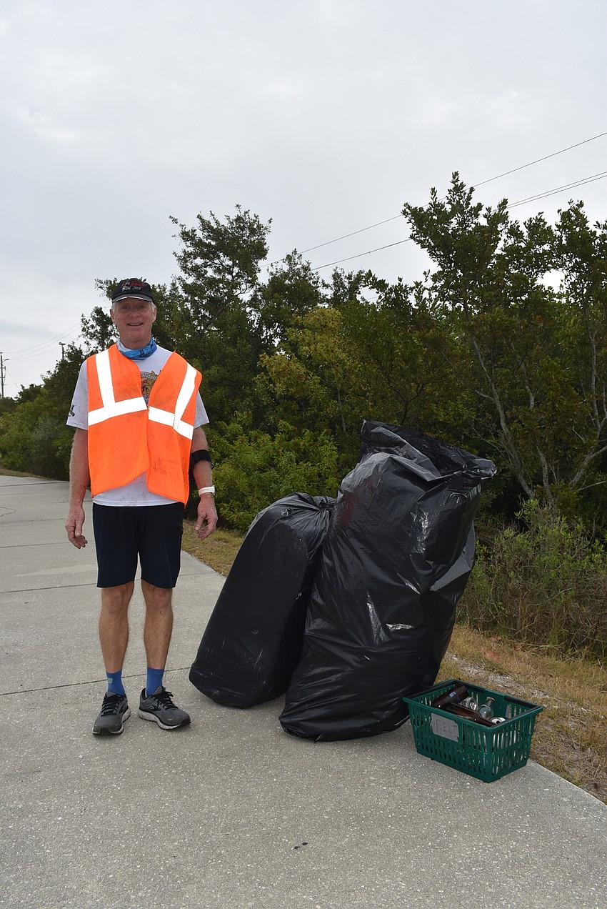 Hank Vroom and his bags of trash.