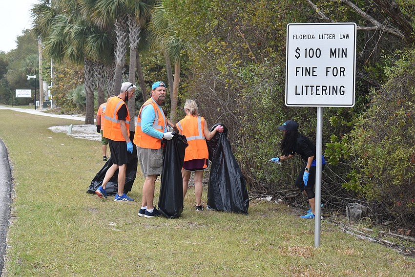 A group of members gather plenty of litter.