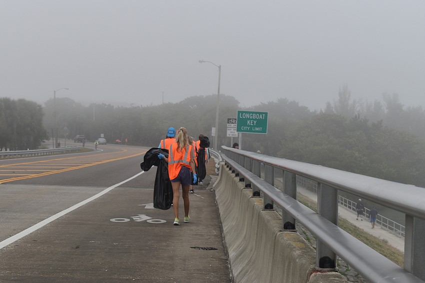 Members cross into the town of Longboat Key.