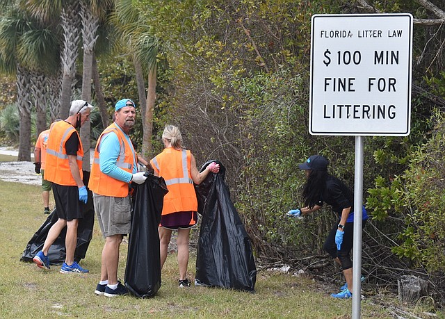 A group of members gather plenty of litter.