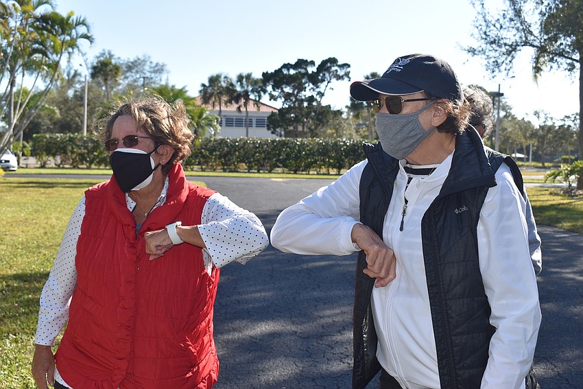 Judy Tobias and Karen Gary say goodbye.