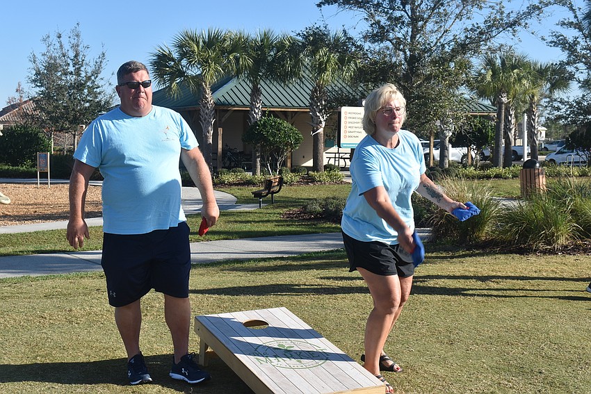 Mike and Kelly Harmon moved to Woodleaf Hammock in August. Kelly Harmon said they didn't know anyone before they started attending Casual Cornhole.