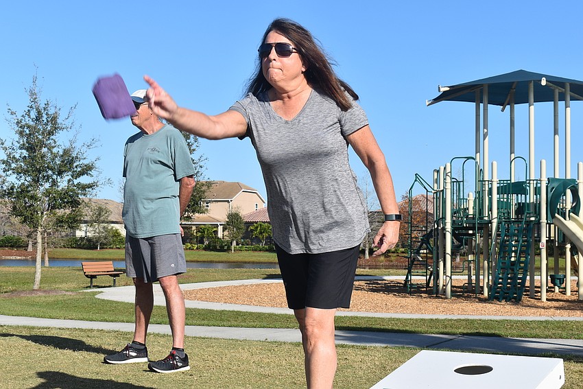 Eagle Trace resident Bobbie Doyle had heard of Casual Cornhole but never played the sport before Feb. 11. She was on a walk in Bob Gardner Park and decided to give it a try. She said it wasn't as difficult as she thought.