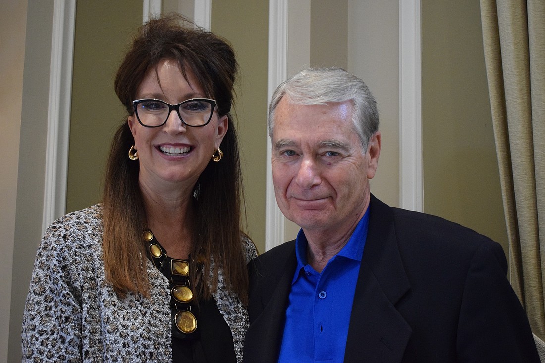 Cynthia Saunders, the superintendent of the School District of Manatee County, works with Ted Lindenberg, the director of Books for Kids, to find ways for the program to continue to support students in the district. File photo.
