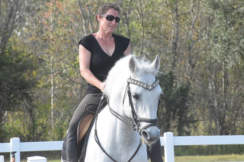 Rebecca McCullough is part of the six generations of the Herrmann family to train and perform with the Lipizzan stallions.