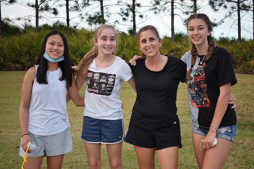 Lakewood Ranch's Josie Boyd, Mia Boyd, Carrie Boyd and Isabella Boyd celebrate as a family. The Gal Pal Party was the first time they saw 