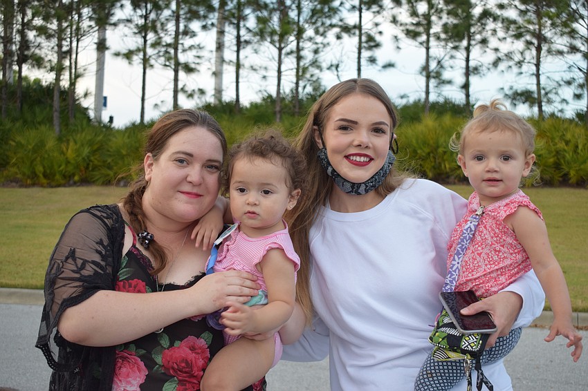 Sarasota's Madeline Valencia and her 14-month-old daughter Francesca Valencia join Anna Rudelich, of Sarasota, and her 14-month-old daughter Kennady Rudelich at the Gal Pal Party.