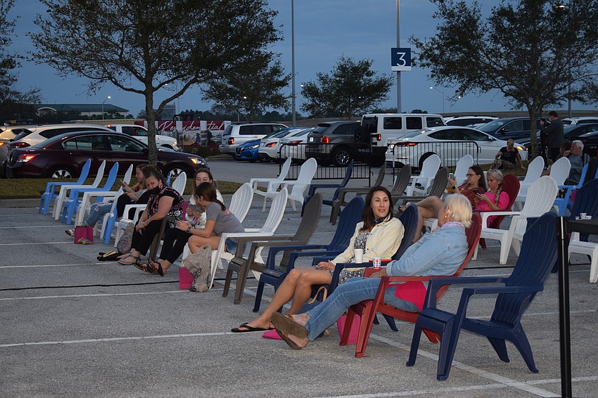 People start getting in their seats for the screening of 