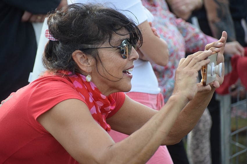 Bearadise owner Monica Welde turns fan when Les Kimes' Pork Chop Revue took over the entertainment at Bear Hugs and Kisses.