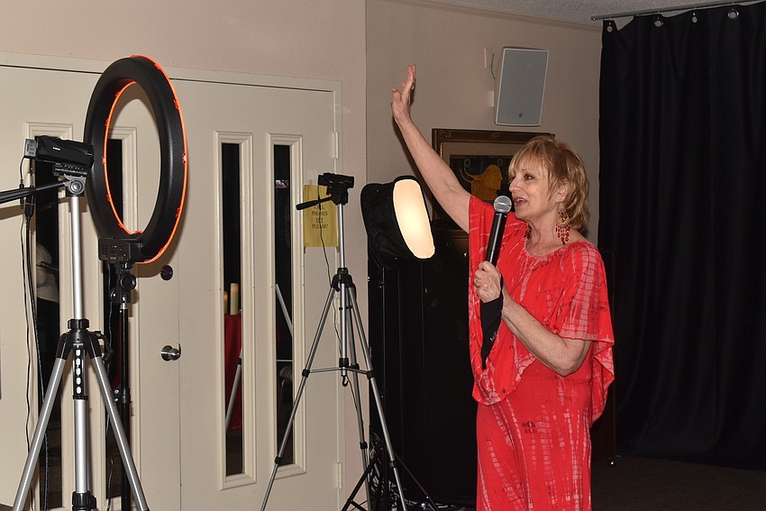 Susan Goldfarb waves goodbye to the Zoom participants.