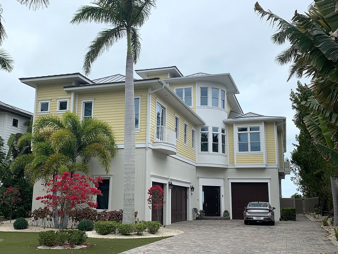 Unit 1 of 5005 Gulf of Mexico Drive was built in 2017 Built in 2017 with five bedrooms, four baths, a pool and 6,380 square feet of living area.