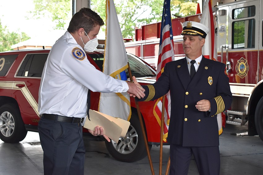 Firefighter and paramedic Zack Shield (left) won the department’s Most Fit Award.