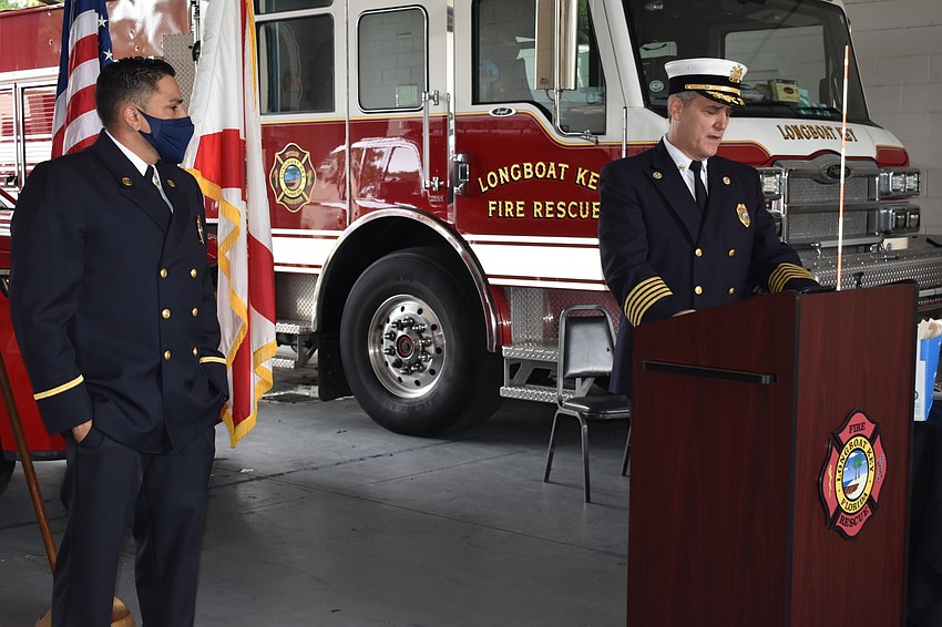 Fire Chief Paul Dezzi recognizes Lt. Jose Rivera during Tuesday morning's ceremony.