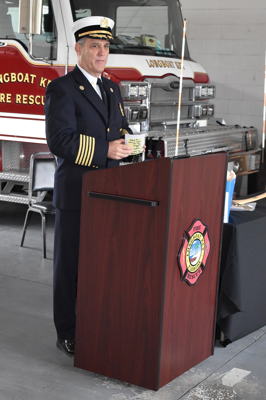 Longboat Key Fire Chief Paul Dezzi speaks during Tuesday morning's ceremony.