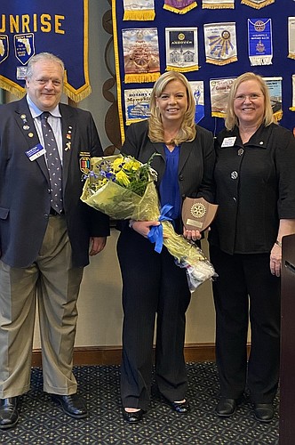 Club president Teresa Taft, Genevieve Judge and District Governor Daryl Keys.