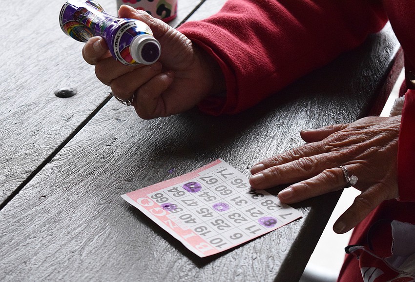 Participants play at least three rounds of bingo during Community Bingo.