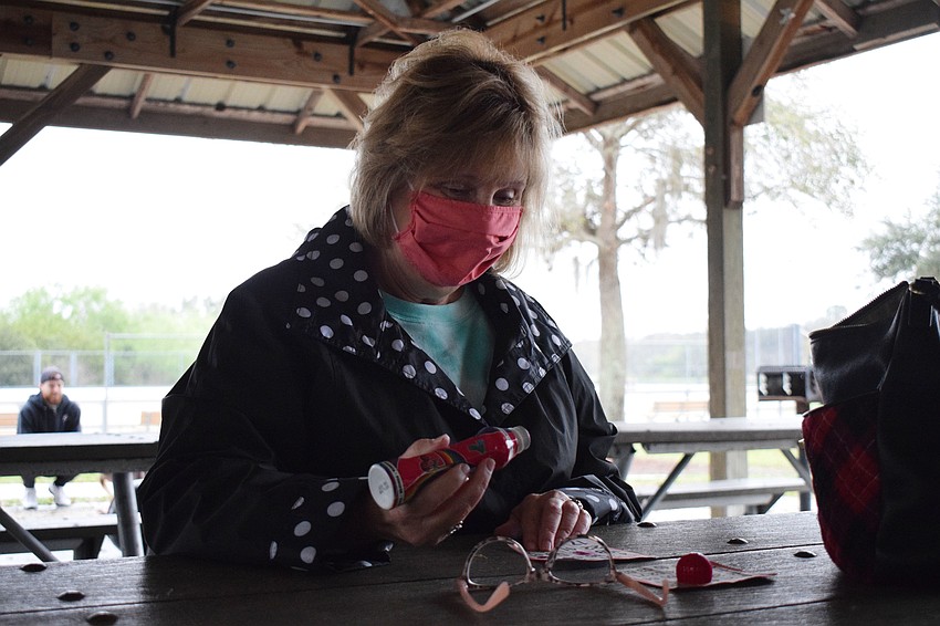 Harmony's Ruth McComas marks another spot on her bingo card.