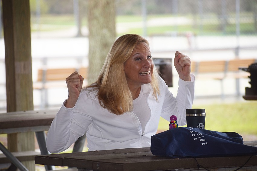 Eagle Trace's Tina Clements celebrates her win. She received a gift card for Grove.