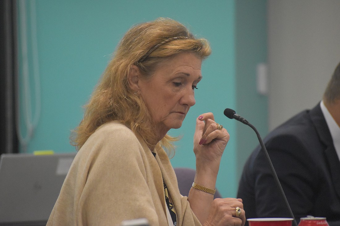 Commissioner Vanessa Baugh was criticized for asking to add neighbors and others to vaccination list.