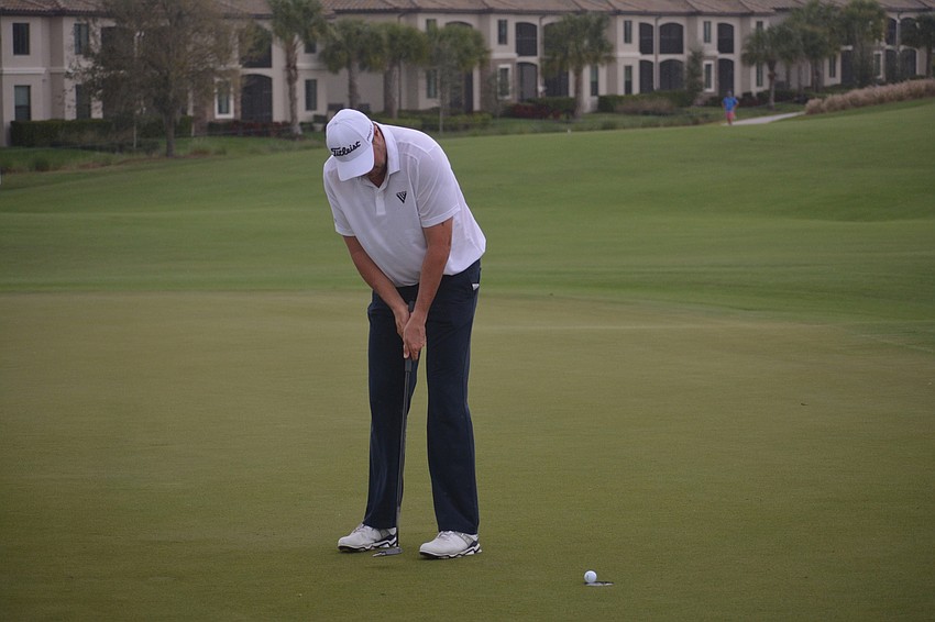 Dawie van der Walt putts for par on the No. 18 hole at Lakewood National. van der Walt was four over par on the day and even for the tournament.