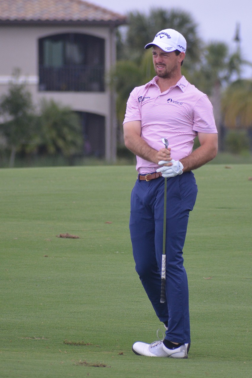 Dawson Armstrong grimaces as he watches his second shot on the No. 1 hole at Lakewood National. Armstrong would par the hole.