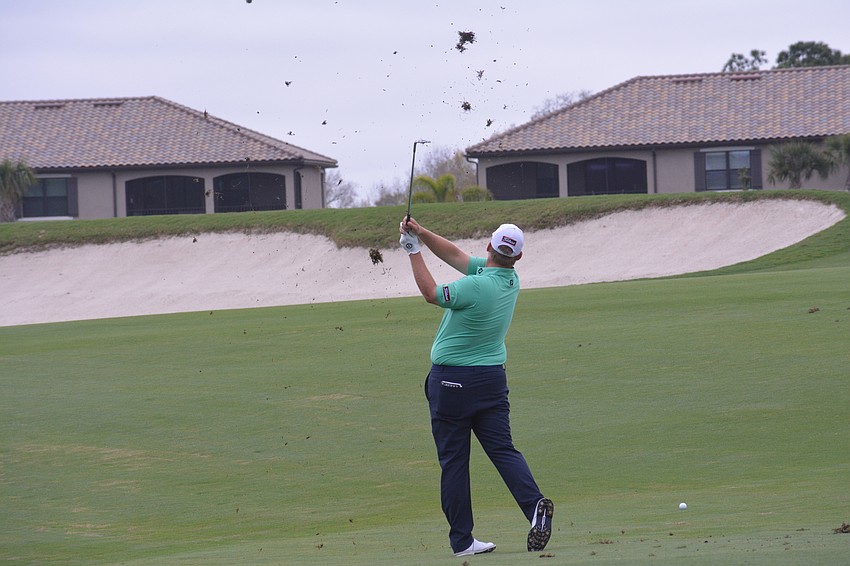 Braden Thornberry kicks up grass on the No. 1 hole at Lakewood National. Thornberry would par the hole.