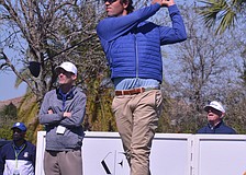 Billy Kennerly tees off on the No. 1 hole at Lakewood National Golf Club. Kennerly would par the hole.