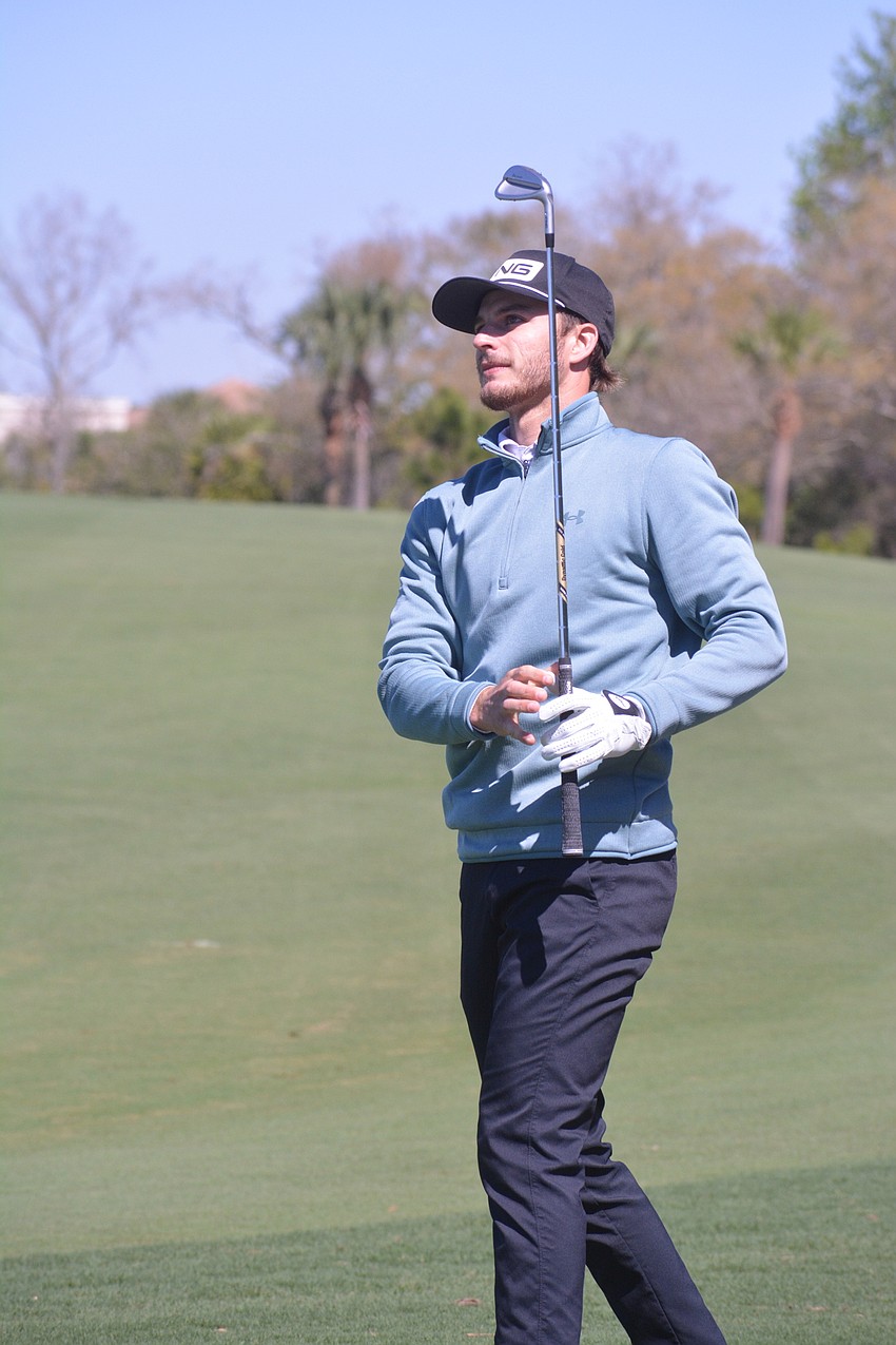 Brett Coletta stares at his second shot on the No. 1 hole at Lakewood National Golf Club. Coletta would par the hole.