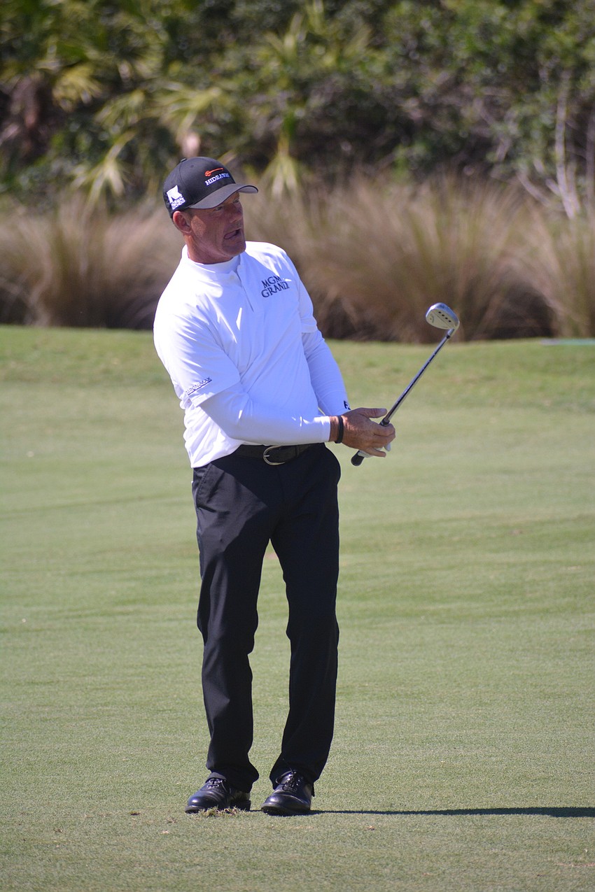 Alex Cejka chips onto the green on the No. 16 hole at Lakewood National Golf Club. Cejka would bogey the hole.