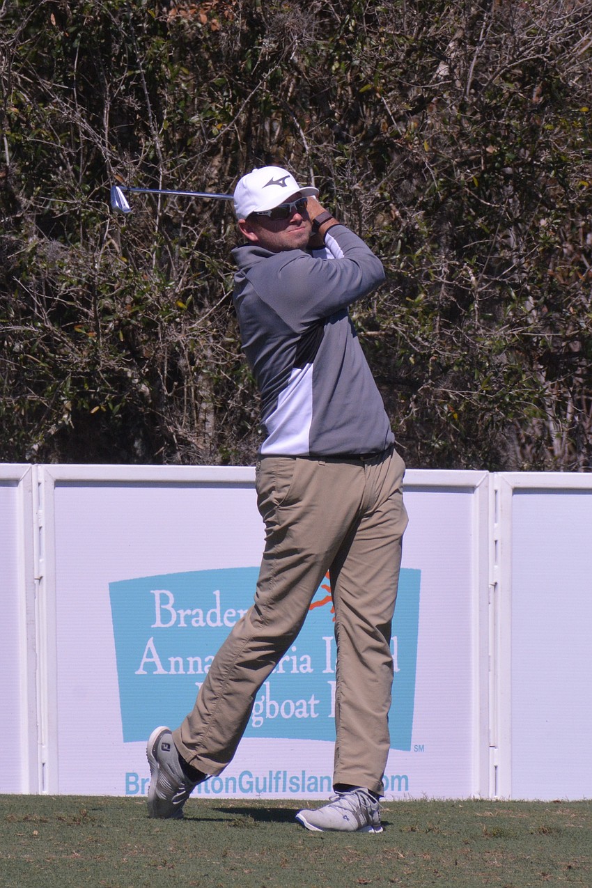 Dan McCarthy tees off from the No. 17 hole at Lakewood National Golf Club. McCarthy would par the hole.