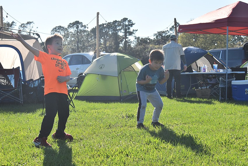 Greenbrook residents Jase Piercy, 5, and Colin Quimby, 5, play Frisbee. Quimby and Piercy are best friends at The Learning Experience daycare center.