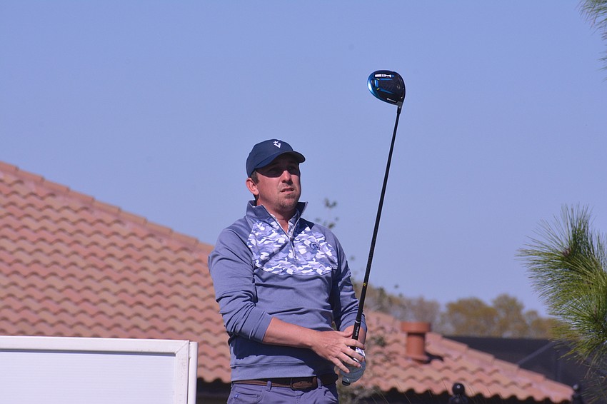Paul Haley II watches his tee shot on the No. 18 hole on Saturday. Haley II would bogey the hole to finish two over par.
