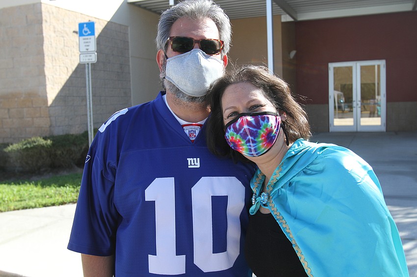 Joshua Leinweber and Director of Youth, Outreach and Engagement Bethany Leinweber set up the day's events.