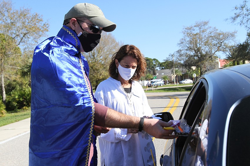 Matt Kahn and Program Director Andrea Eifert handed out noisemakers and creative masks.