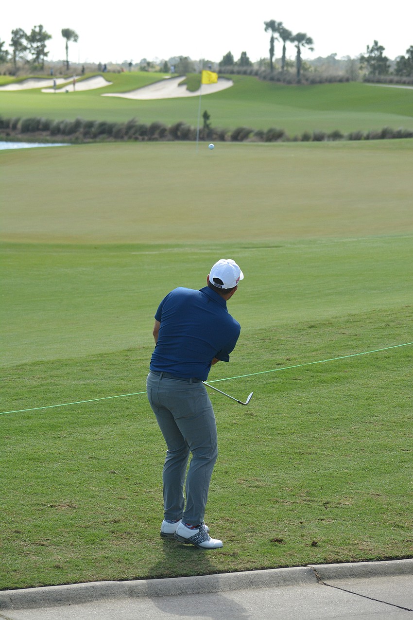 Roberto Diaz hits onto the green on the No. 11 hole from just off the cart path. Diaz would par the hole.
